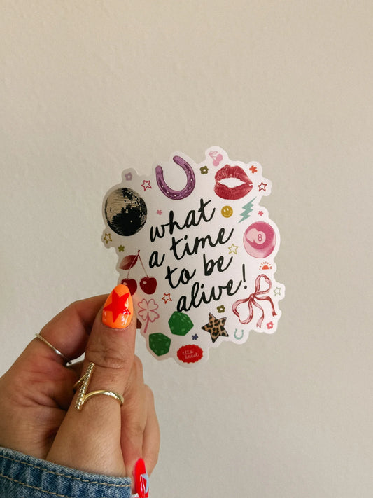 WHAT A TIME TO BE ALIVE STICKER